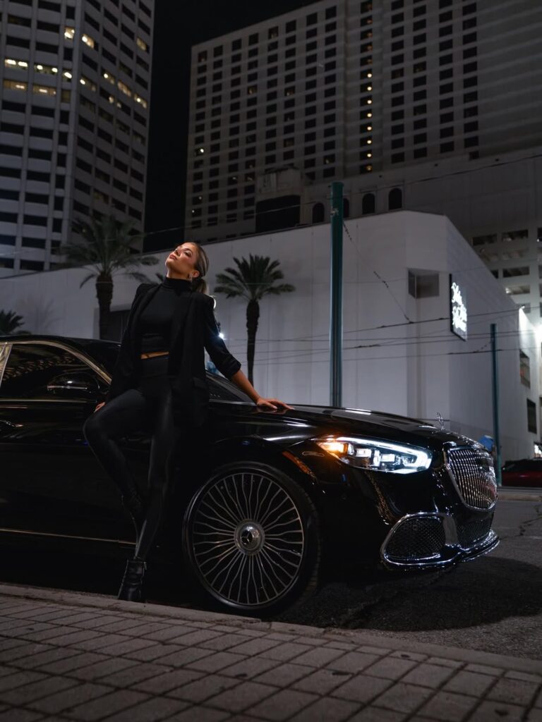 Luxury chauffeur service in New Orleans with high-end black car and professional driver